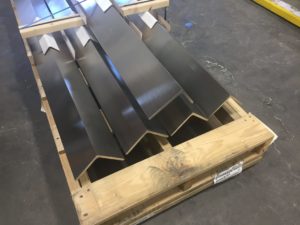 Metal Finishing - Structural Stainless Steel Angles. Straight-line #4 Finish on Outside Surfaces of 3/8” Material
