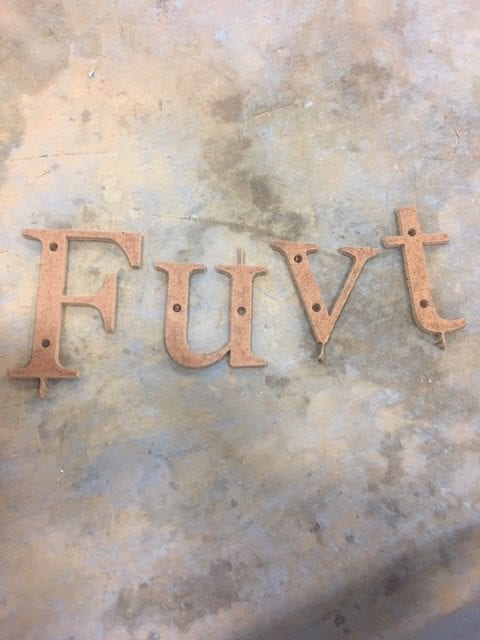 (Precision plywood templates used for marking same letter – same hole locations)
